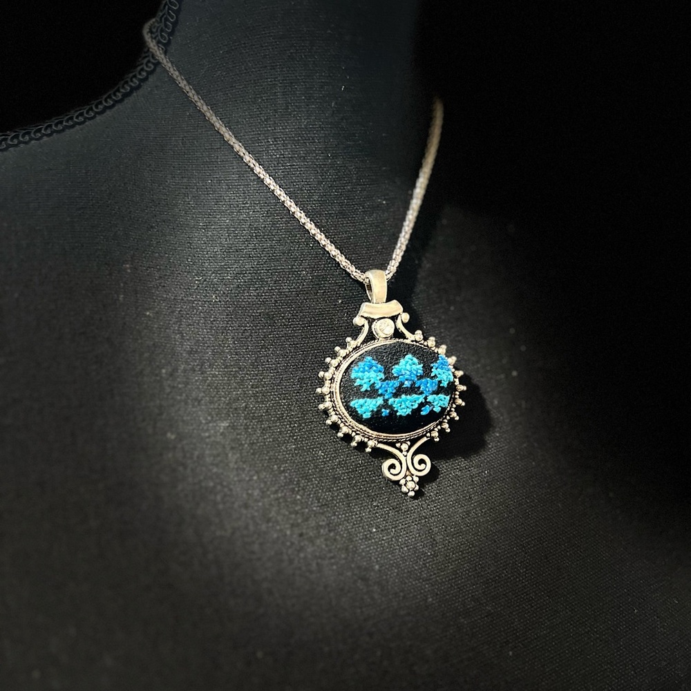 Elegant Silver and Blue Pendant Necklace